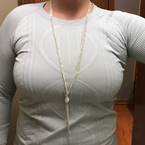 Silver multi chain necklace.